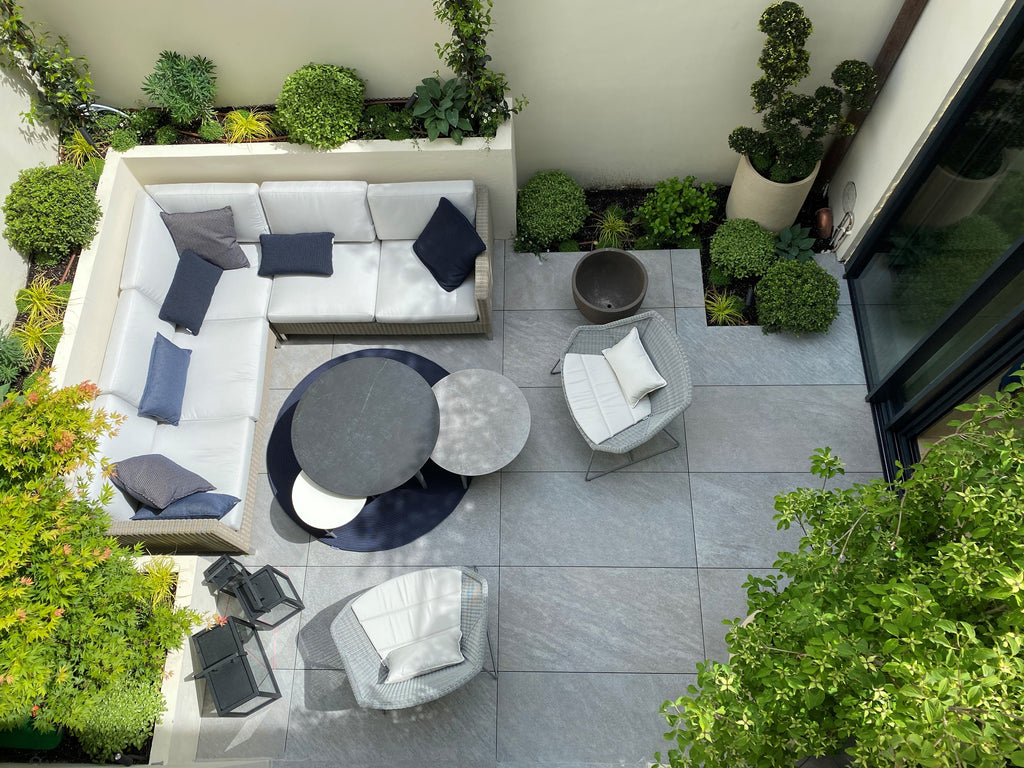 Modern outdoor lounge area with Scandinavian outdoor furniture