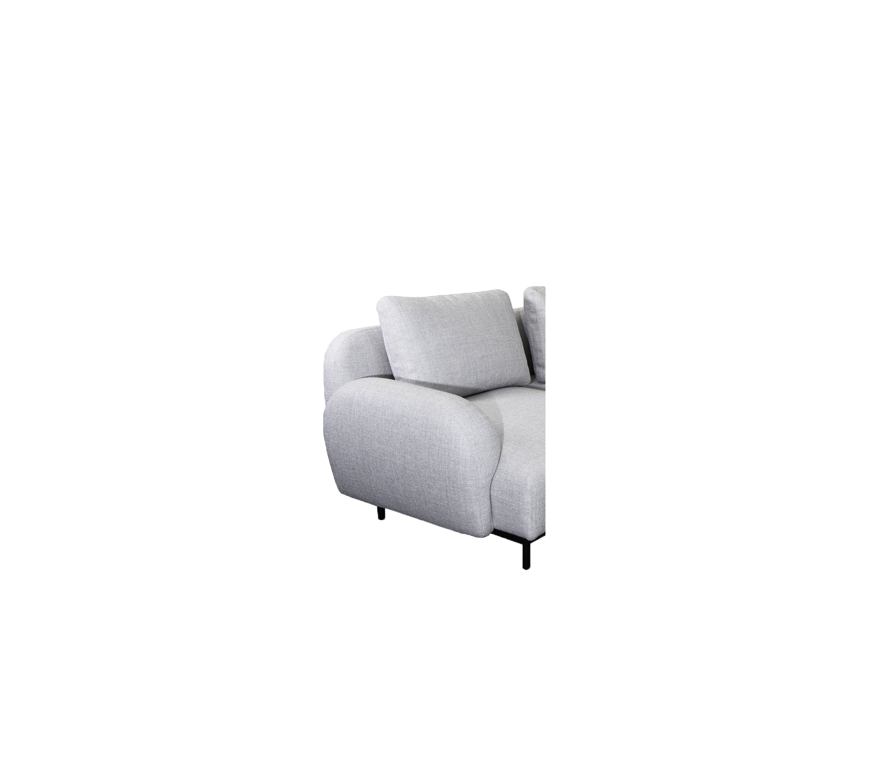 Light gray sectional sofa with plush cushions and curved armrest, designed for comfort and style.