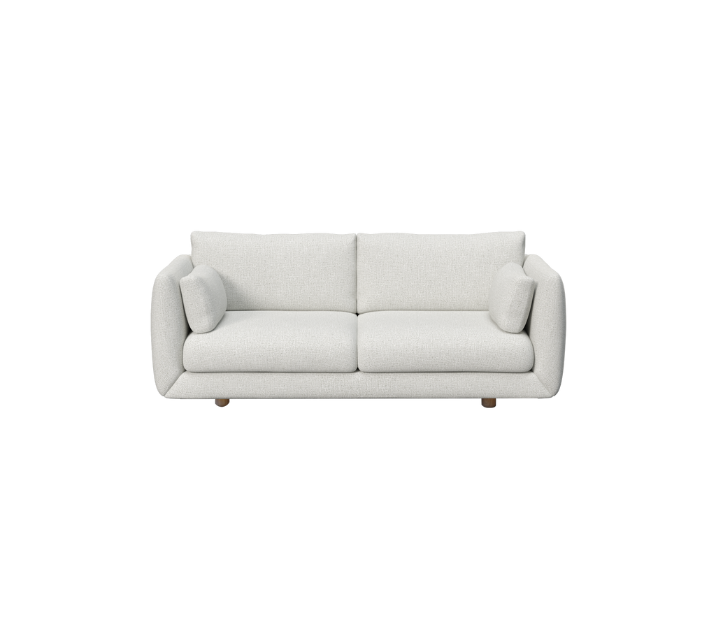 Light grey sofa with rounded cushions in a modern, minimalist style.
