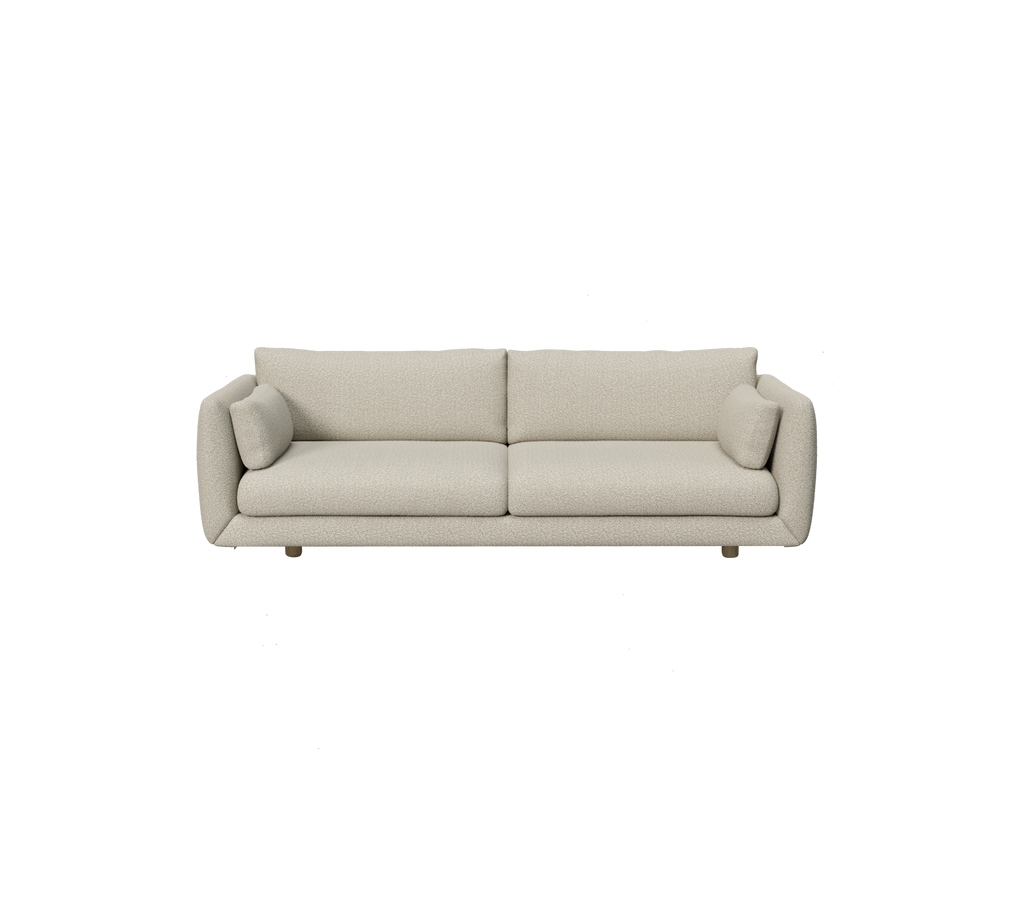 Modern light brown sofa with rounded cushions in a minimalist design.