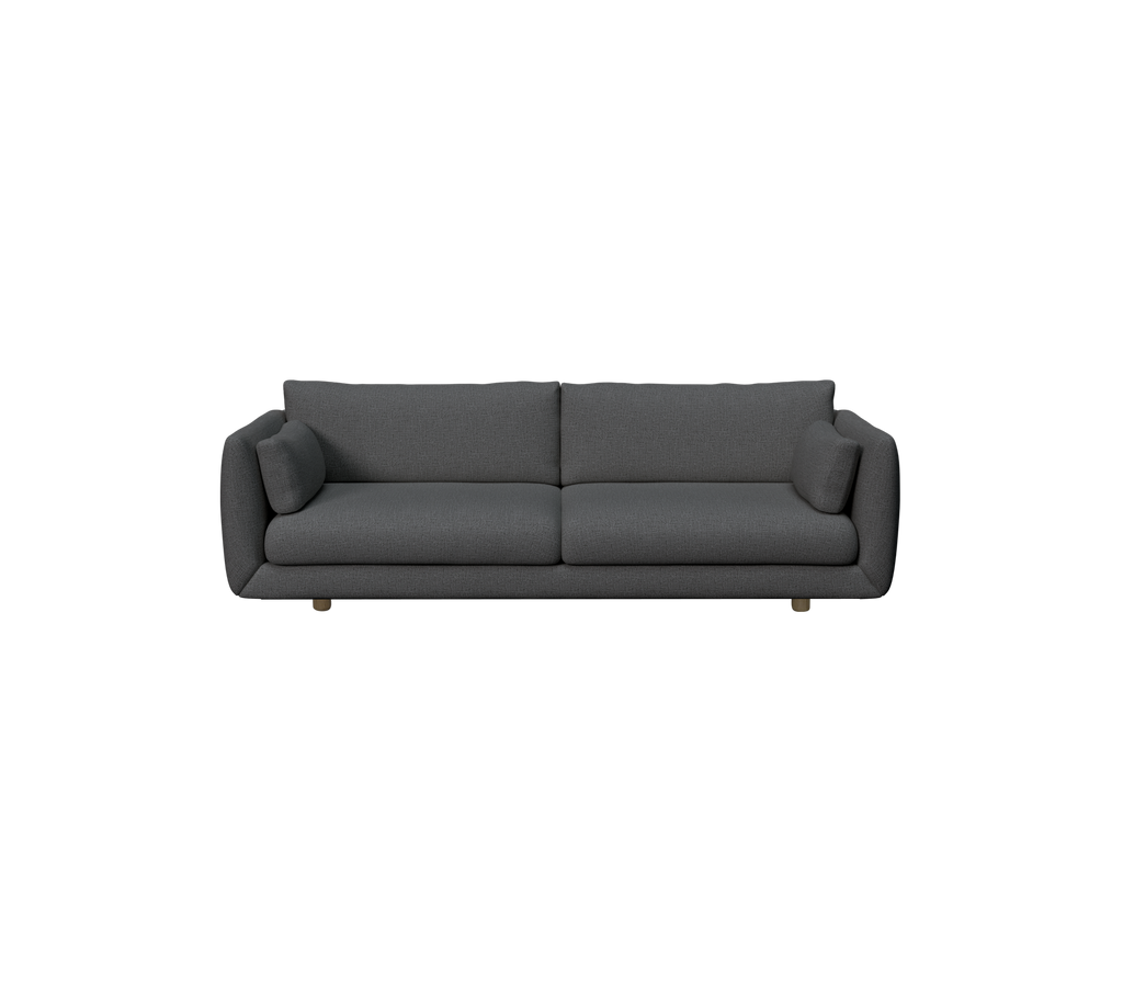 Dark green modern sofa with plush cushions.