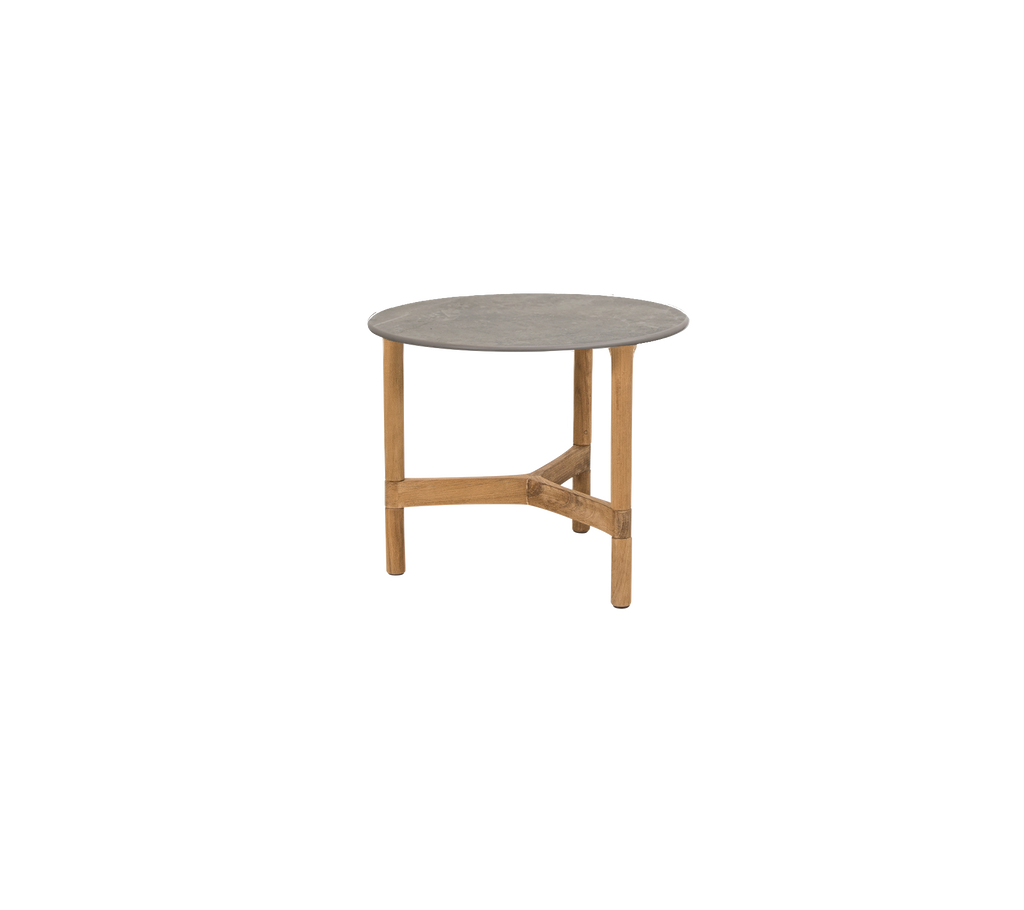 Round taupe table with teak legs.