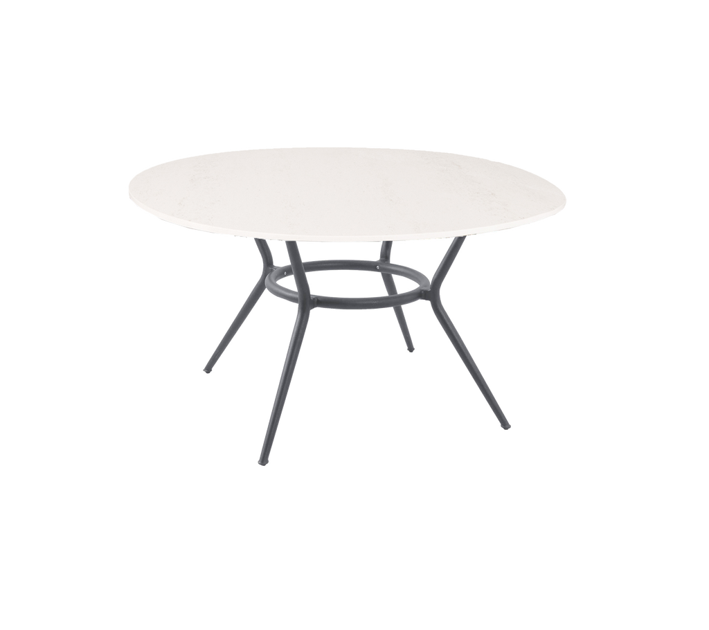 Round table with a white surface and a modern, contrasting base design. Ideal for dining or casual gatherings.