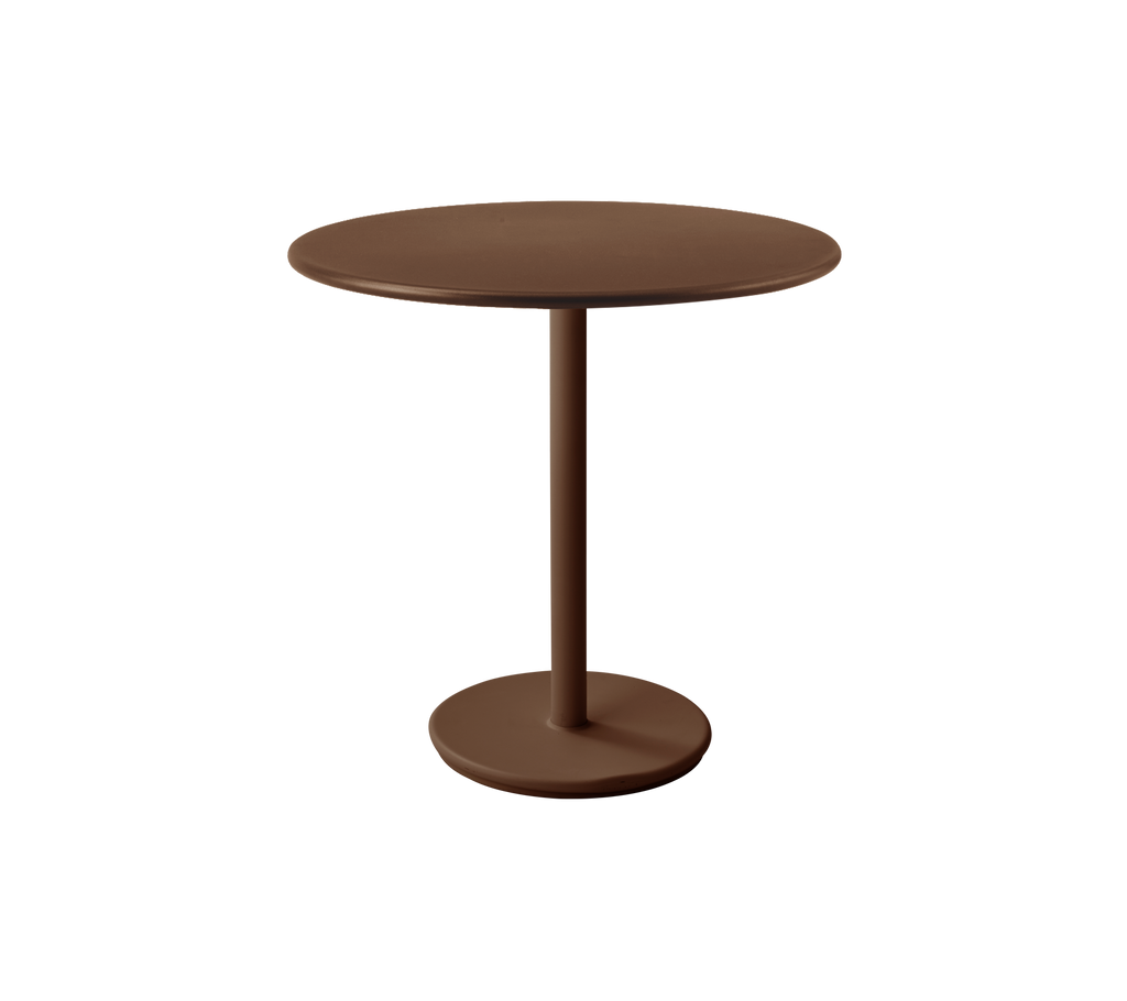 A round desert red table with a simple pedestal base.