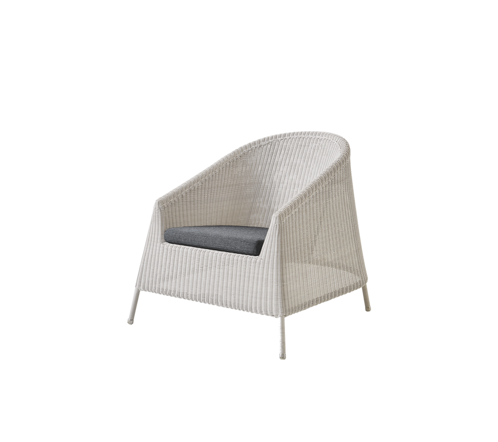 Modern sand chair with grey cushion.