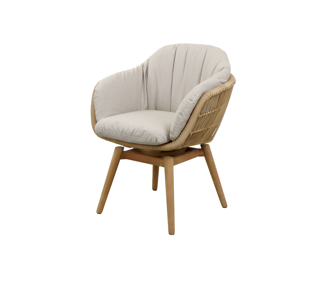 A stylish chair featuring a curved backrest, soft cream upholstery, and a natural wooden frame for a modern and cozy look.