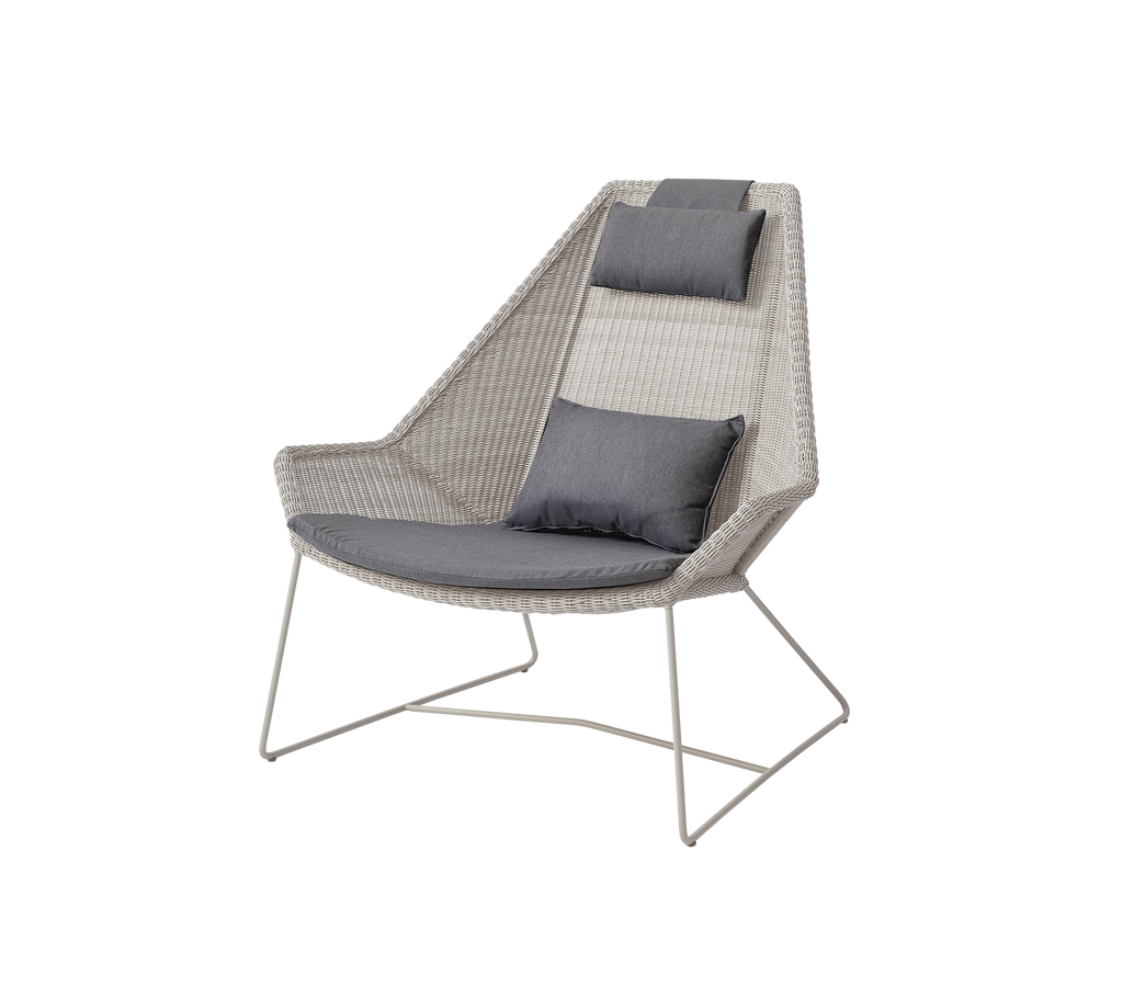 Modern grey chair with sand cushion, featuring a unique design.