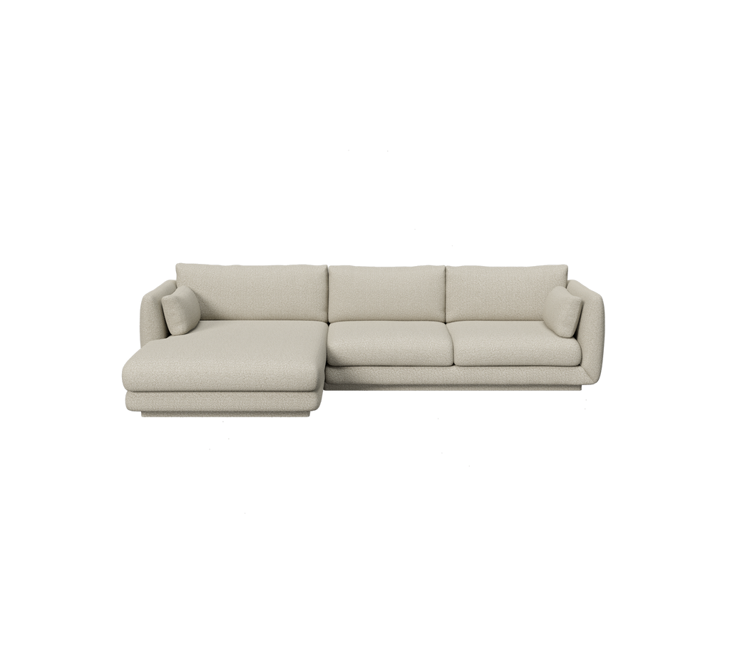Light brown modern sofa with a chaise lounge design.
