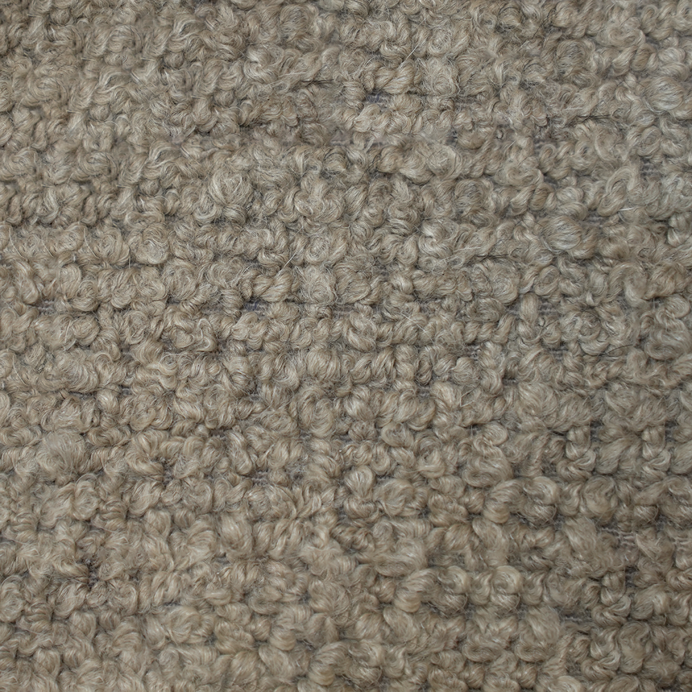 Textured beige fabric close-up.
